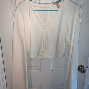 Cream bell sleeved crop top